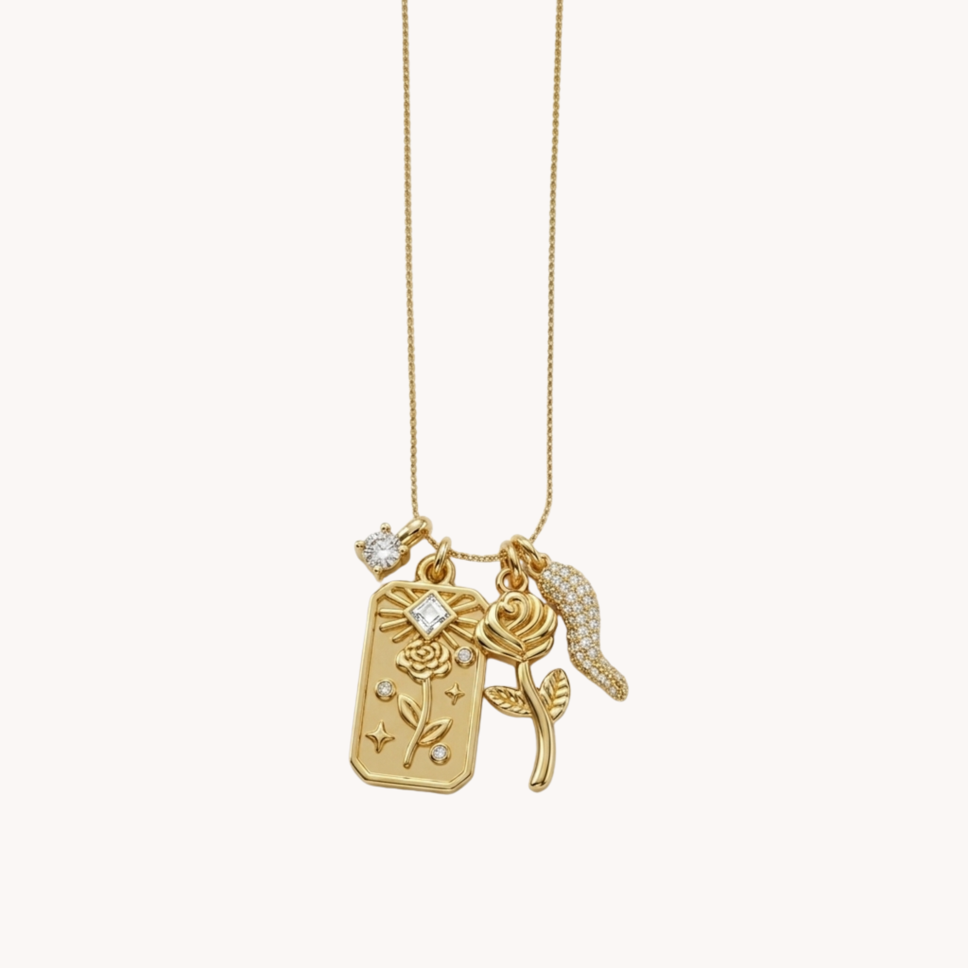 COLLANA ICONIC BLOOM - collana con charms multipli rosa, medaglia tarocco e cornetto portafortuna in acciaio oro