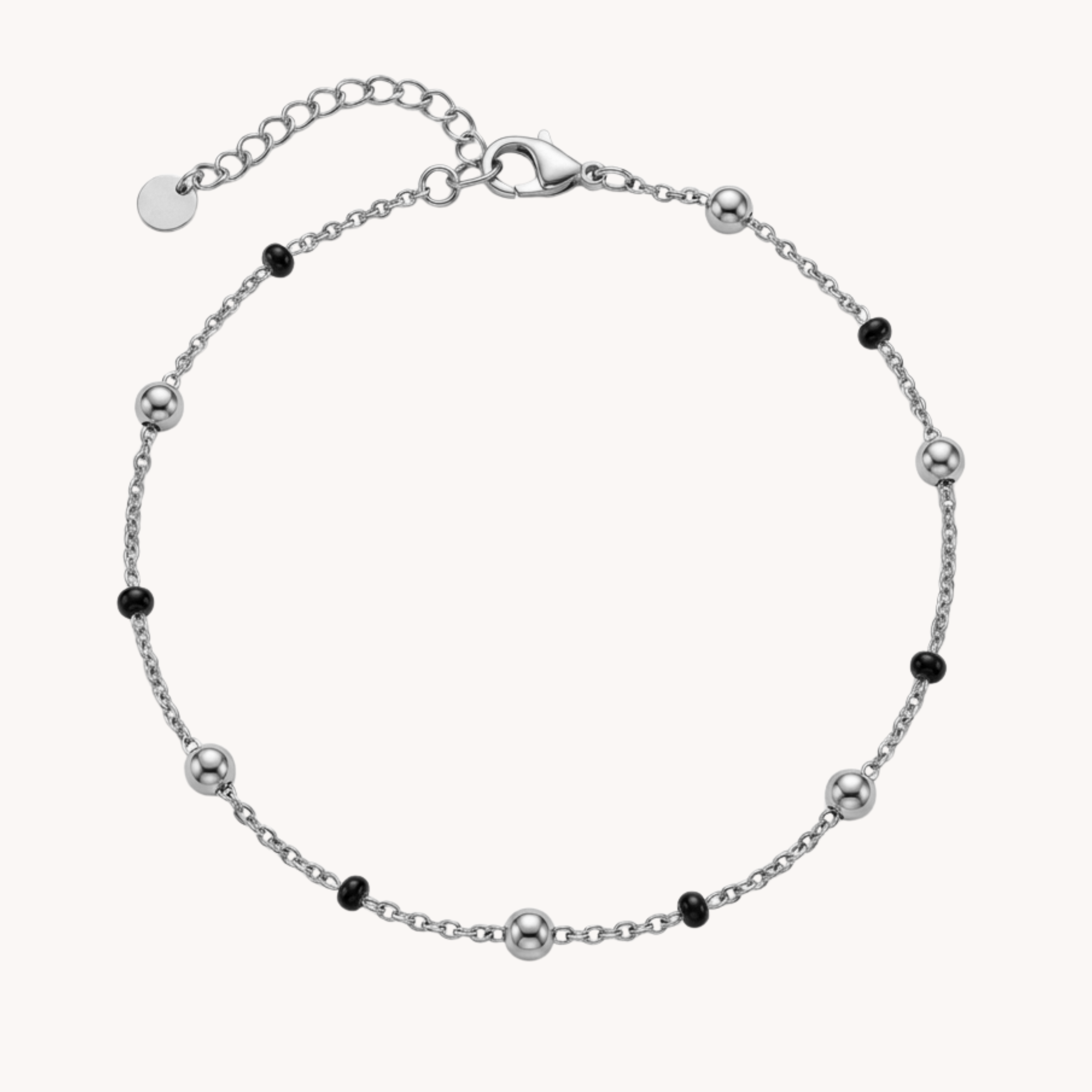 CAVIGLIERA ECLIPSE ESSENTIAL - cavigliera a catenina sottile con sfere oro e micro perline nere in acciaio
