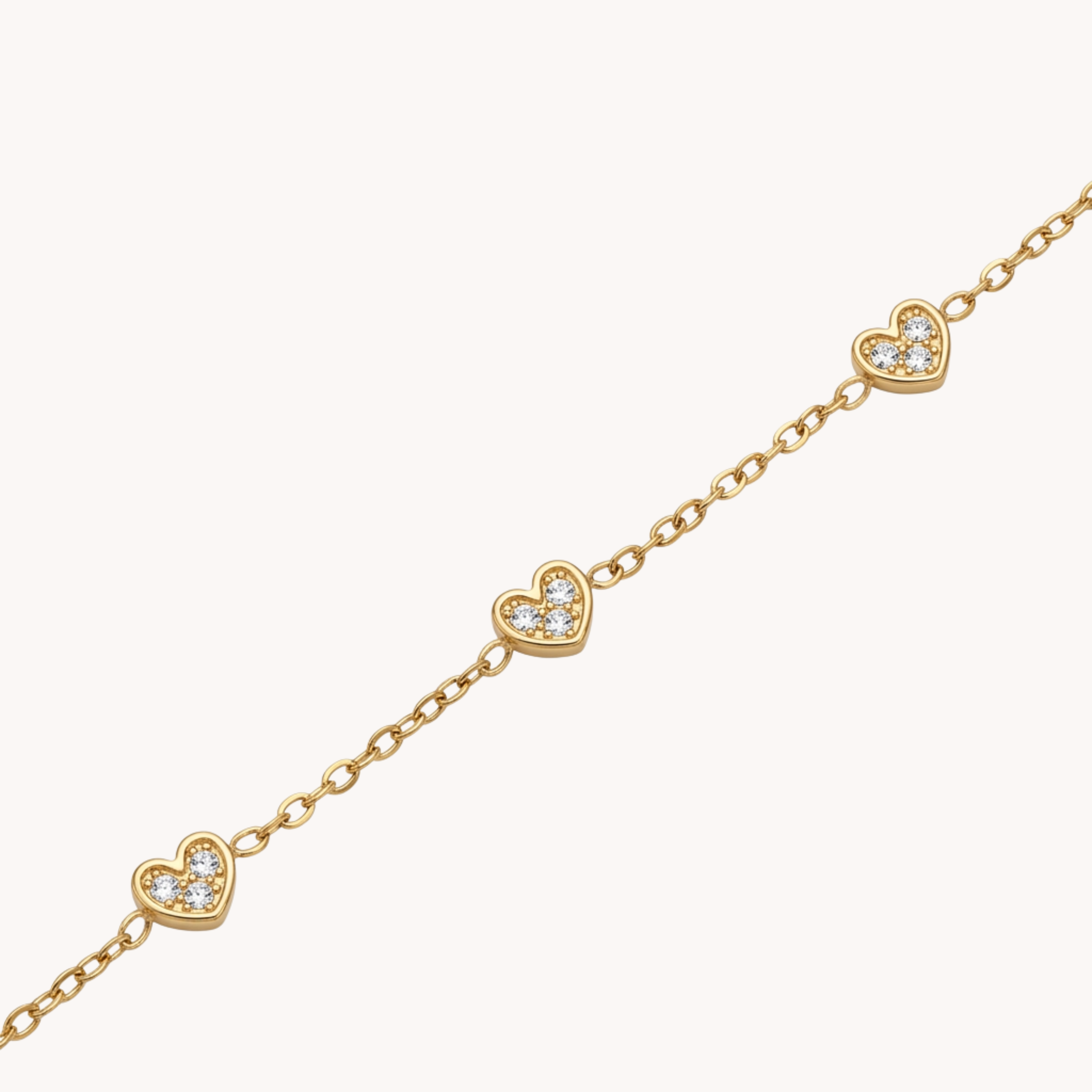 BRACCIALE LOVELY - bracciale con charms a cuore e pavé di zirconi in acciaio oro