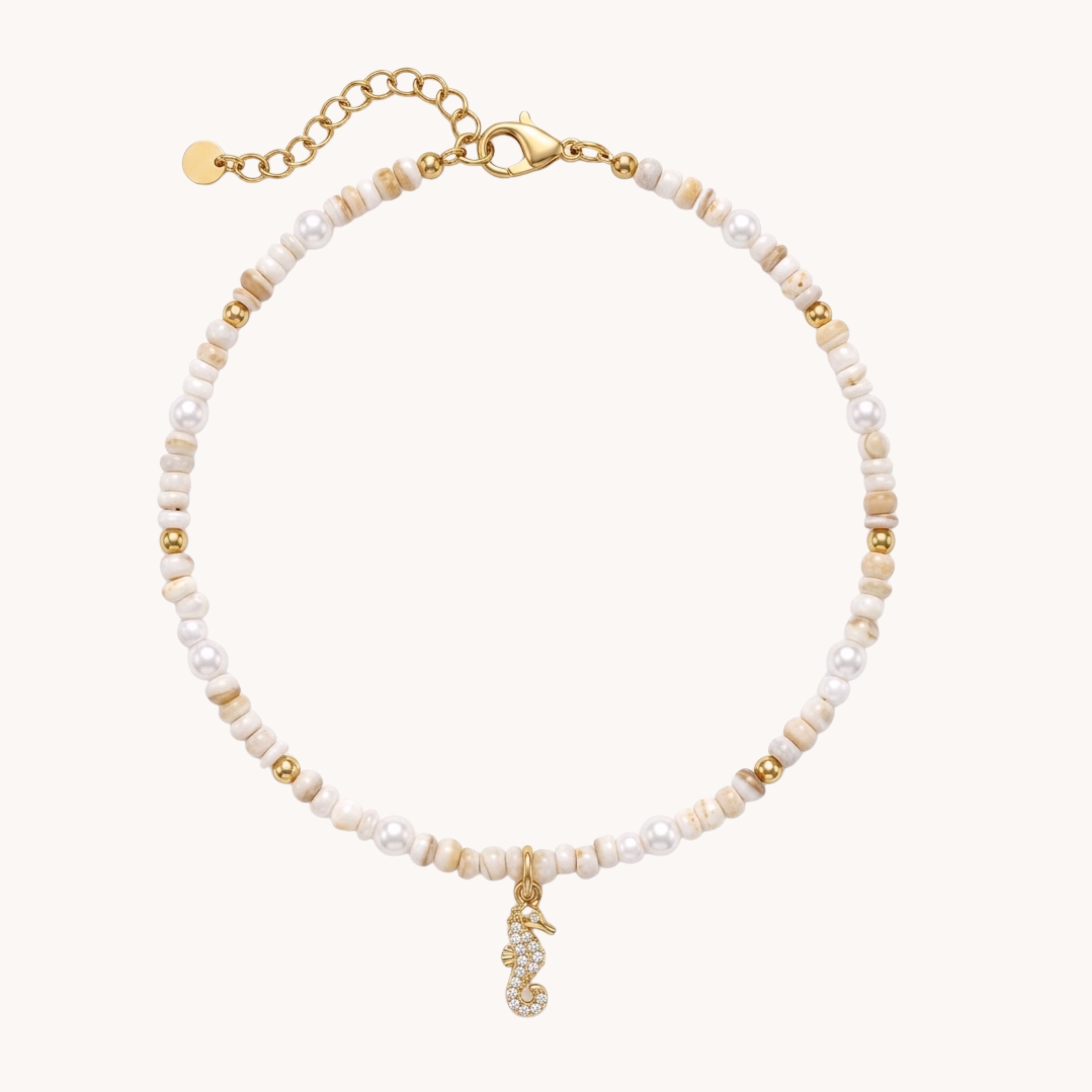 CAVIGLIERA SEAHORSE SHINE - perline sabbia, perle bianche e charm ippocampo con zirconi in acciaio