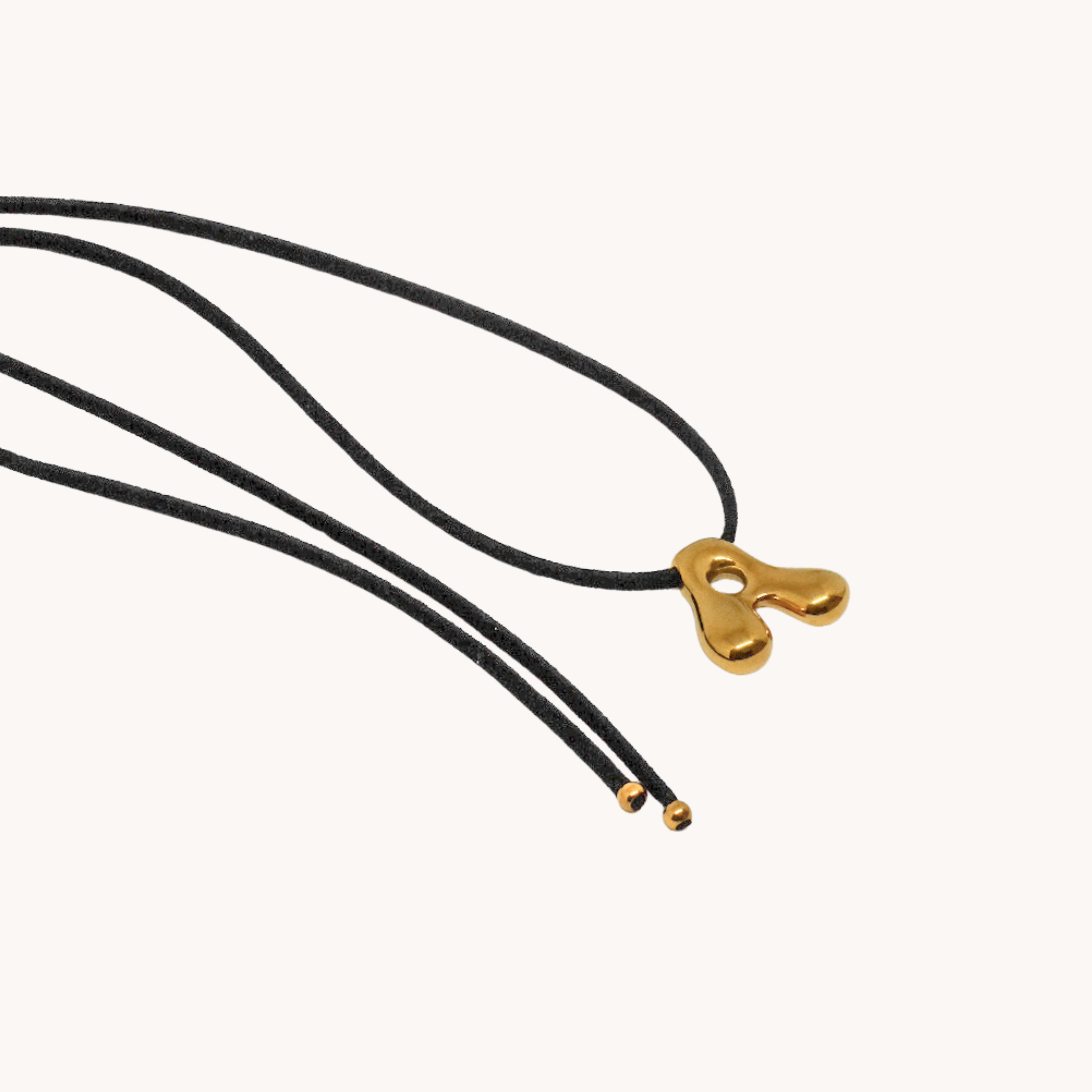 CHOKER SCAMOSCIATO LETTERA BOMBATA
