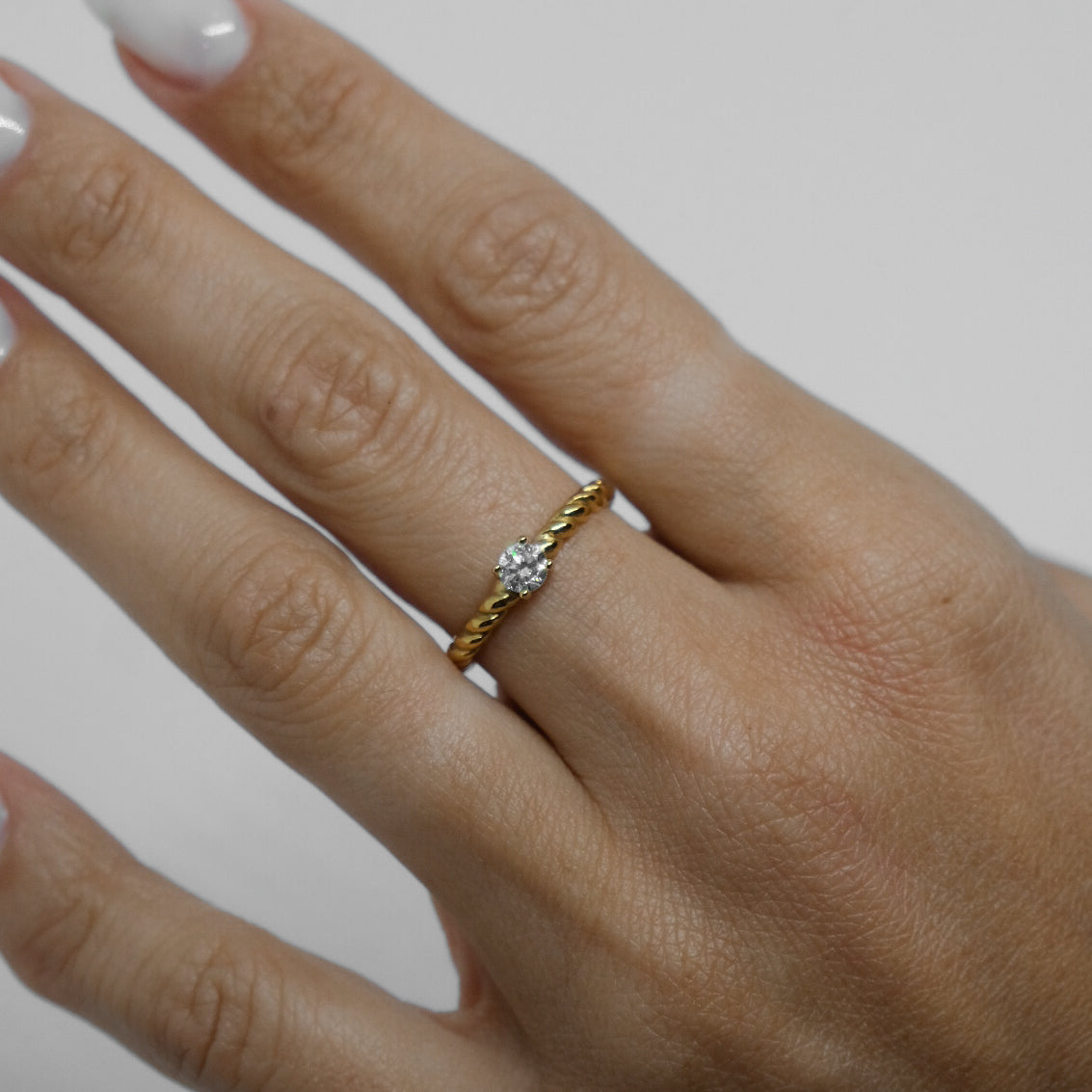 ANELLO INTRECCIATO PUNTO LUCE