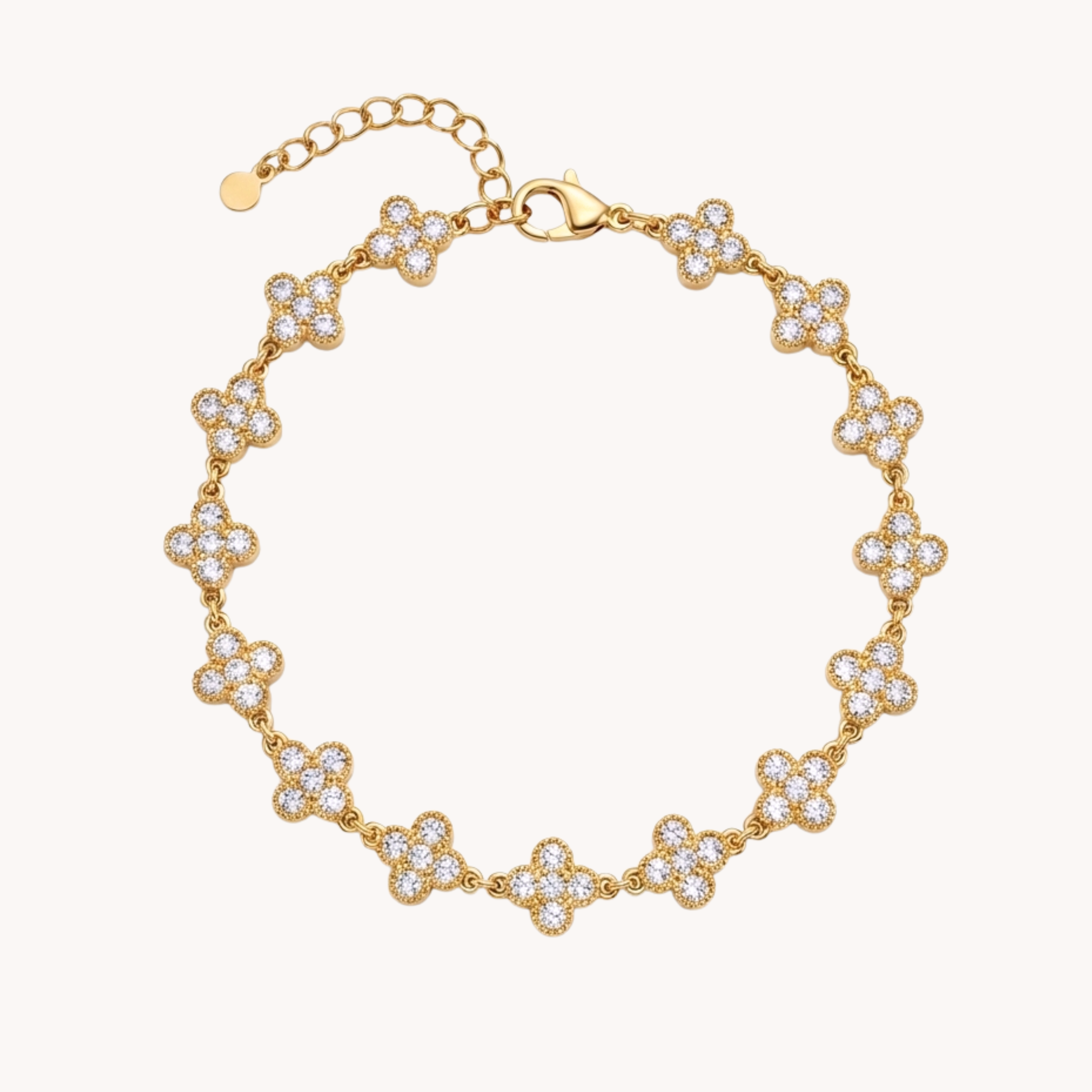 Bracciale Quadrifoglio Shine Clover VANDEM in acciaio oro, bracciale da donna a maglia snodata con quadrifogli tempestati di strass bianchi lucidi.