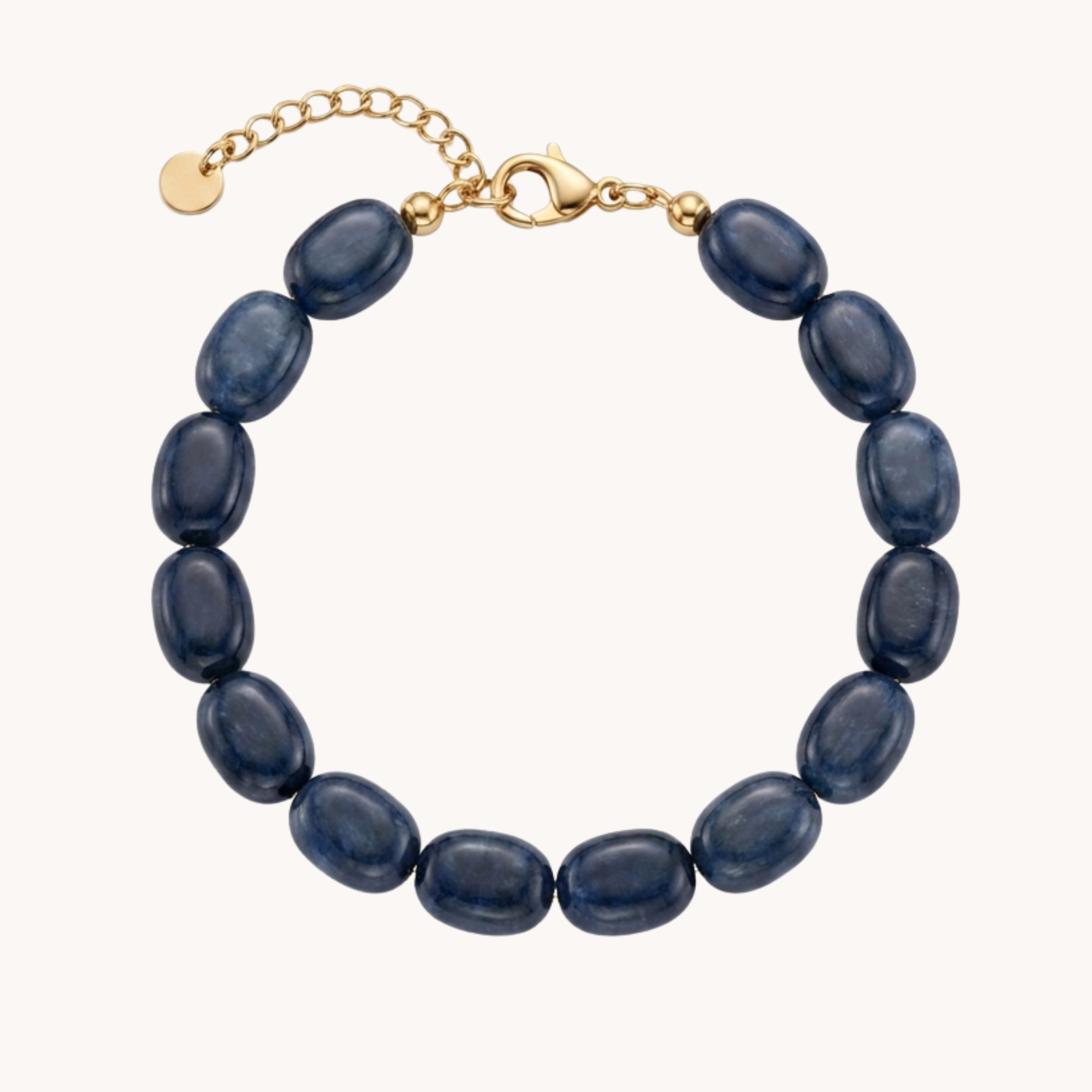Bracciale Perle Oval Denim Luxury VANDEM in acciaio oro, bracciale da donna a filo singolo con grandi perle ovali lisce blu denim e chiusura lucida