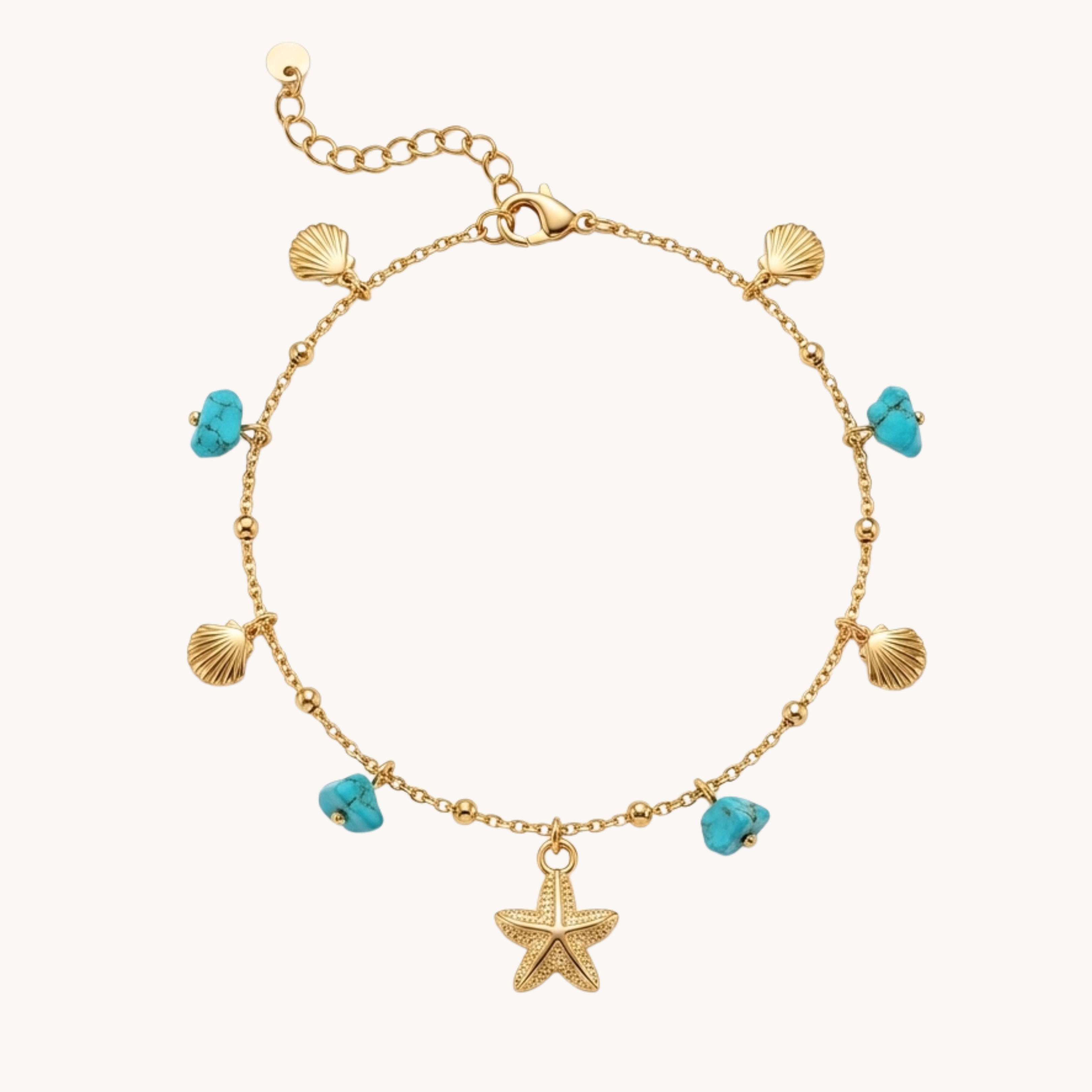 Cavigliera Turquoise Reef Shimmer VANDEM in acciaio oro, cavigliera da donna con ciondoli di conchiglie, stella marina centrale e perle turchesi grezze