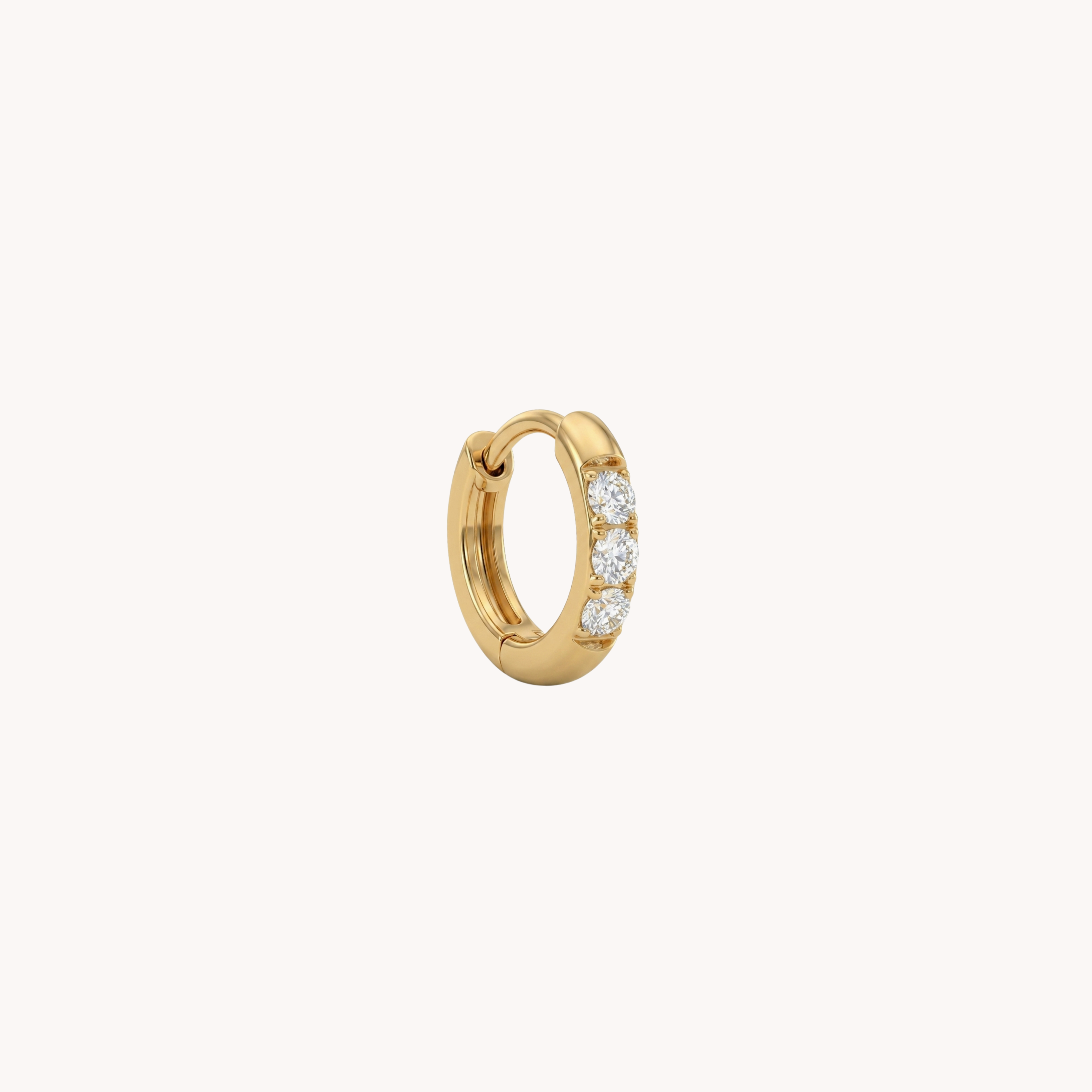 Mono Orecchino Helix Mini VANDEM in acciaio oro, orecchino singolo da donna a cerchietto mini con strass bianchi lucidi a griffe