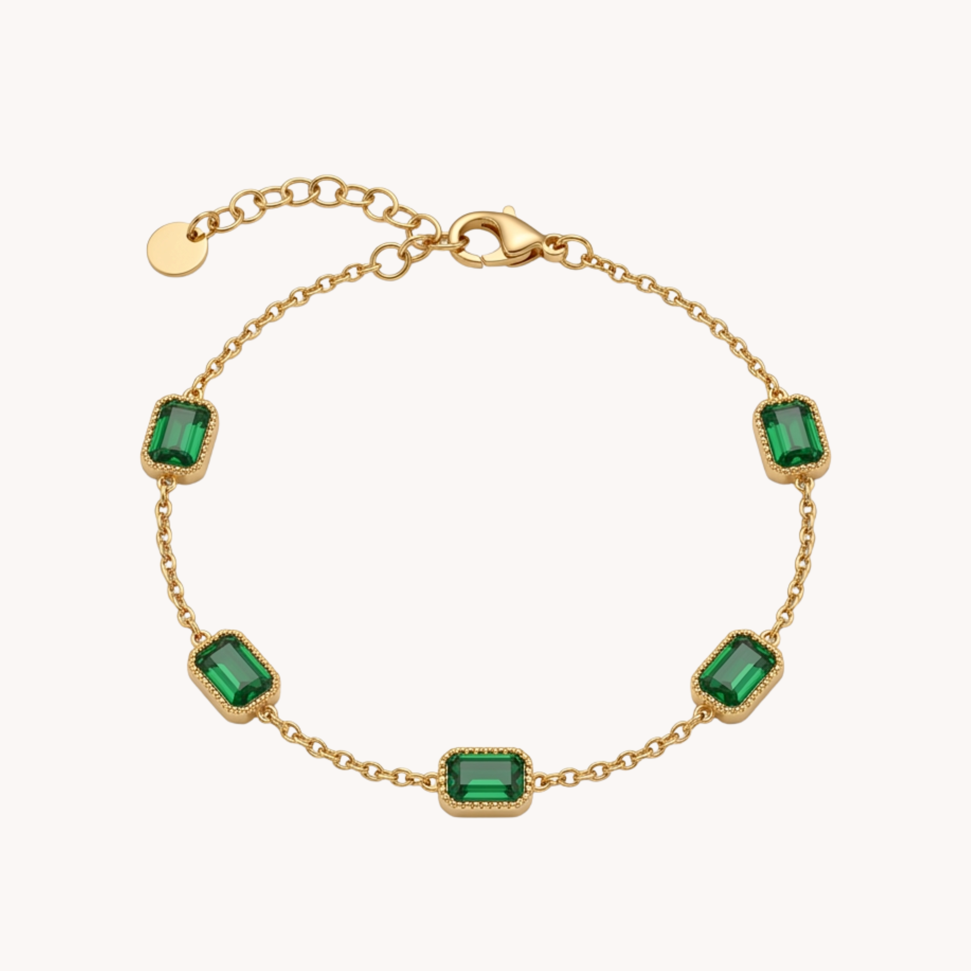 BRACCIALE IMPERIAL GREEN - bracciale con castoni rettangolari e zirconi verde smeraldo in acciaio oro