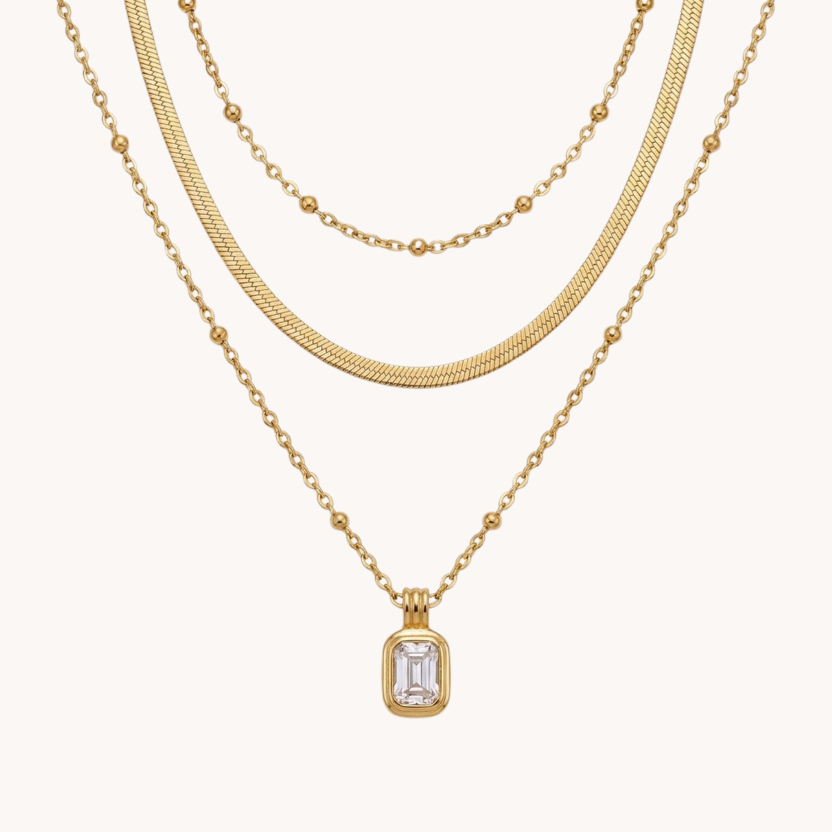 TRIPLA COLLANA EMERALD CUT