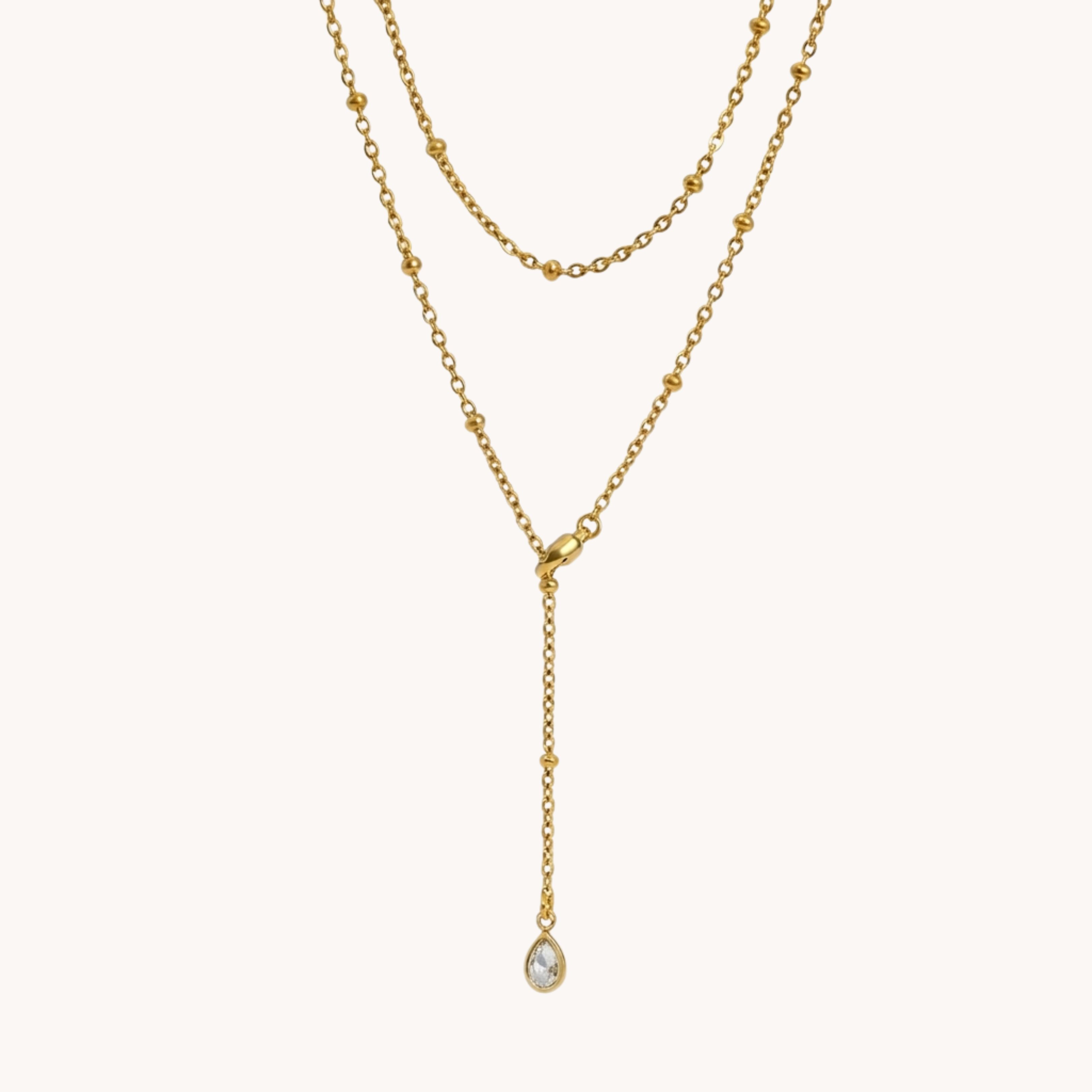 COLLANA SWITCH & GLOW - collana doppia multifilo a cravattina con perline e punto luce a goccia in acciaio oro