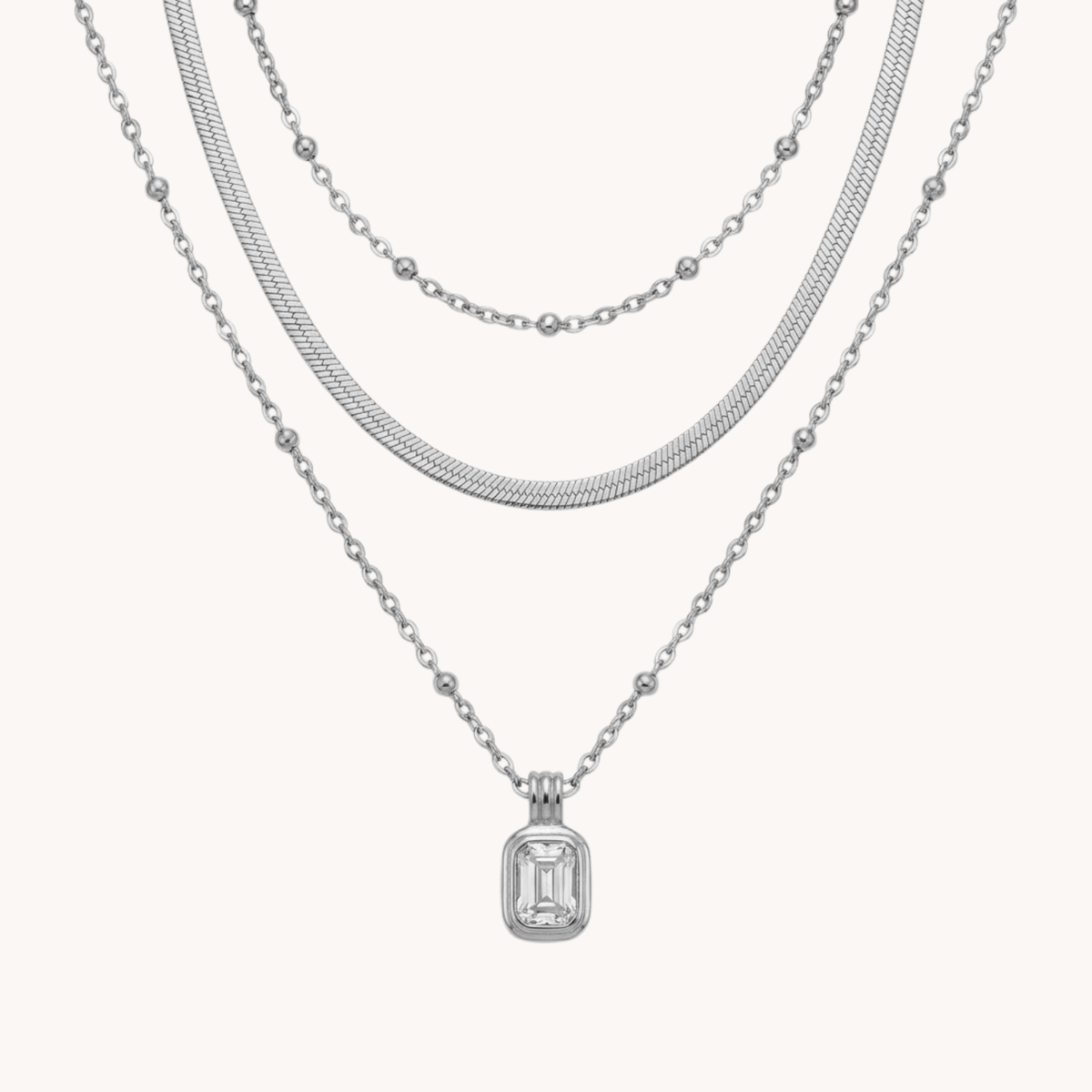 TRIPLA COLLANA EMERALD CUT