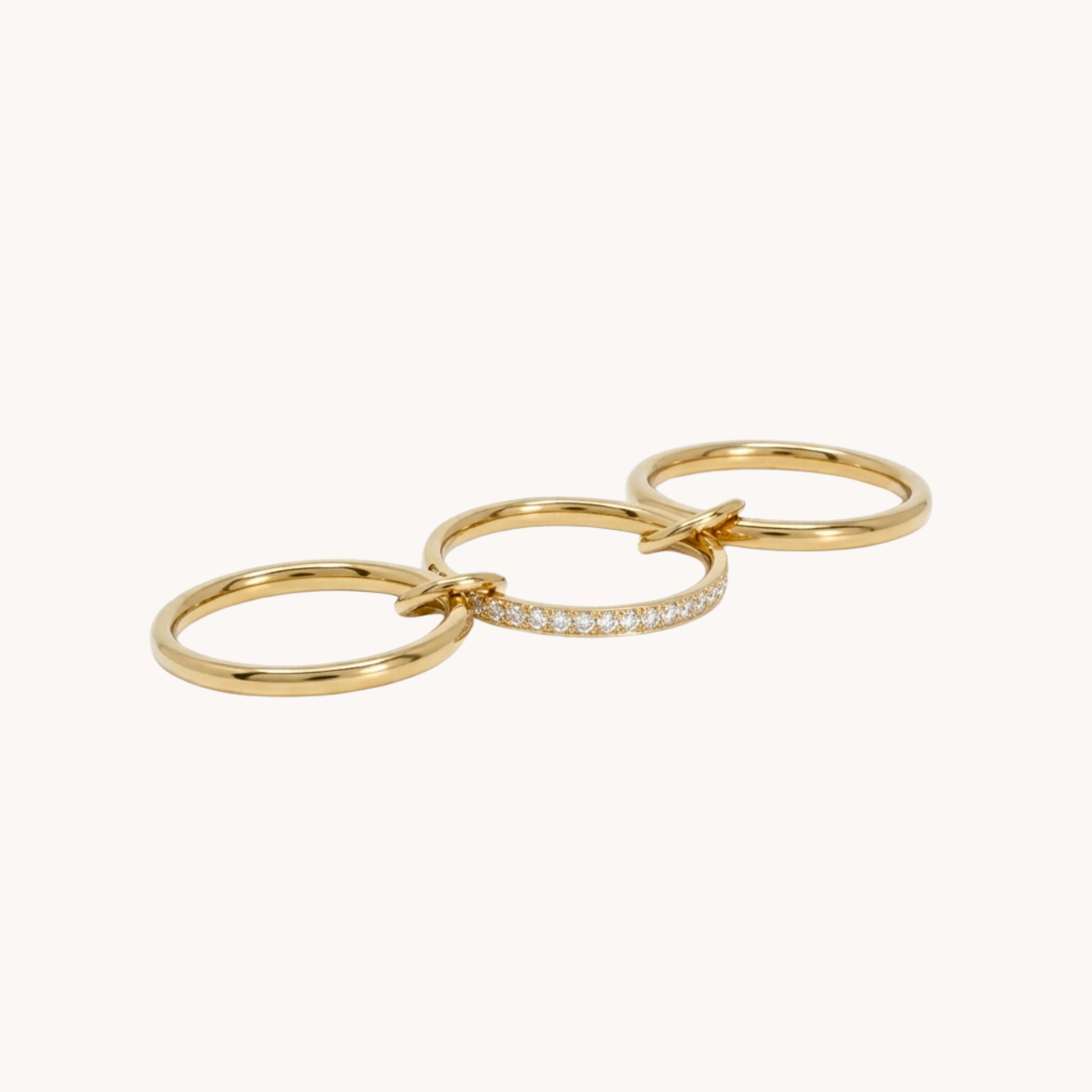 ANELLO SYNERGY - anello a 3 fasce in acciaio oro e zirconi