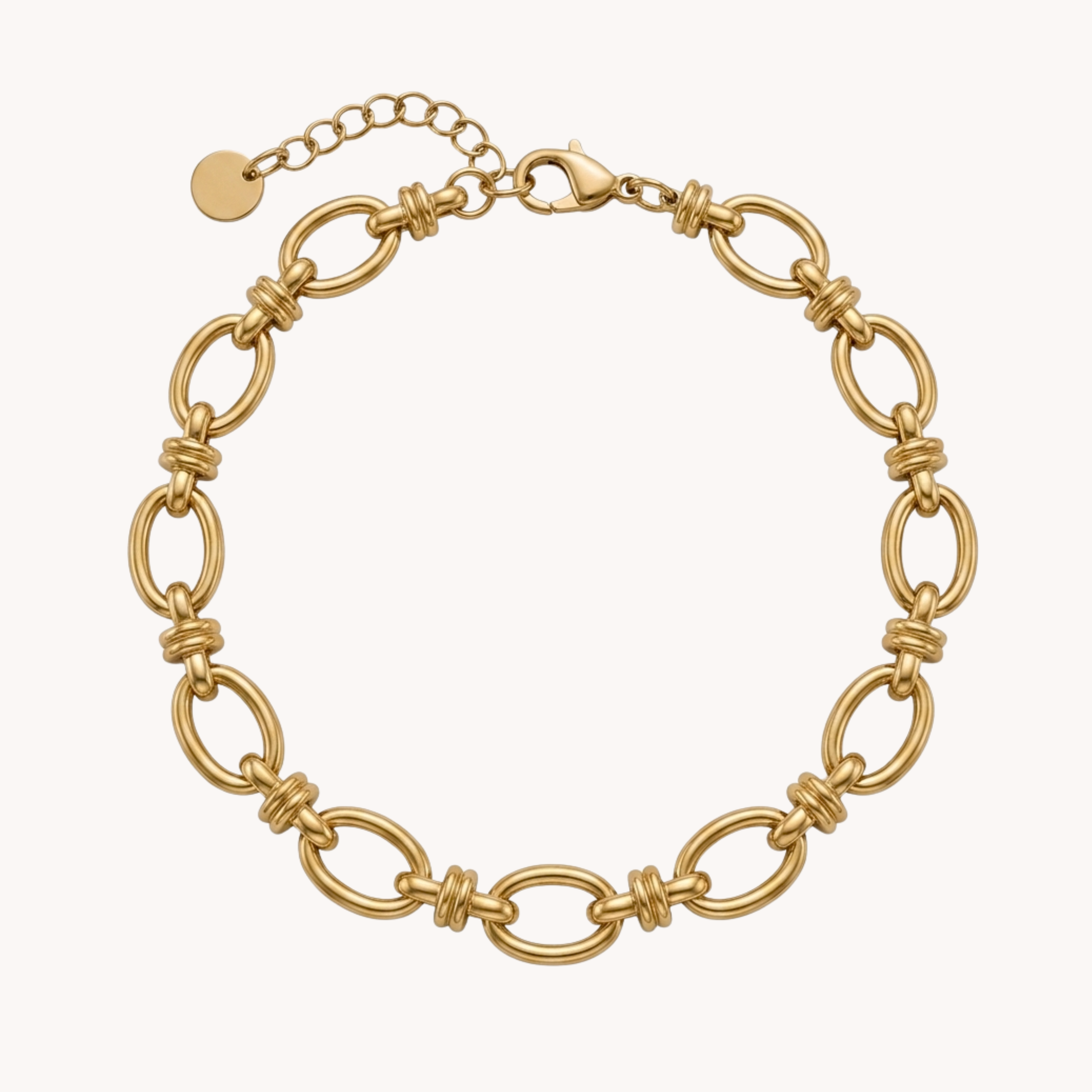BRACCIALE FANCY LINK - bracciale a catena con maglie ovali e dettagli intrecciati a croce in acciaio oro