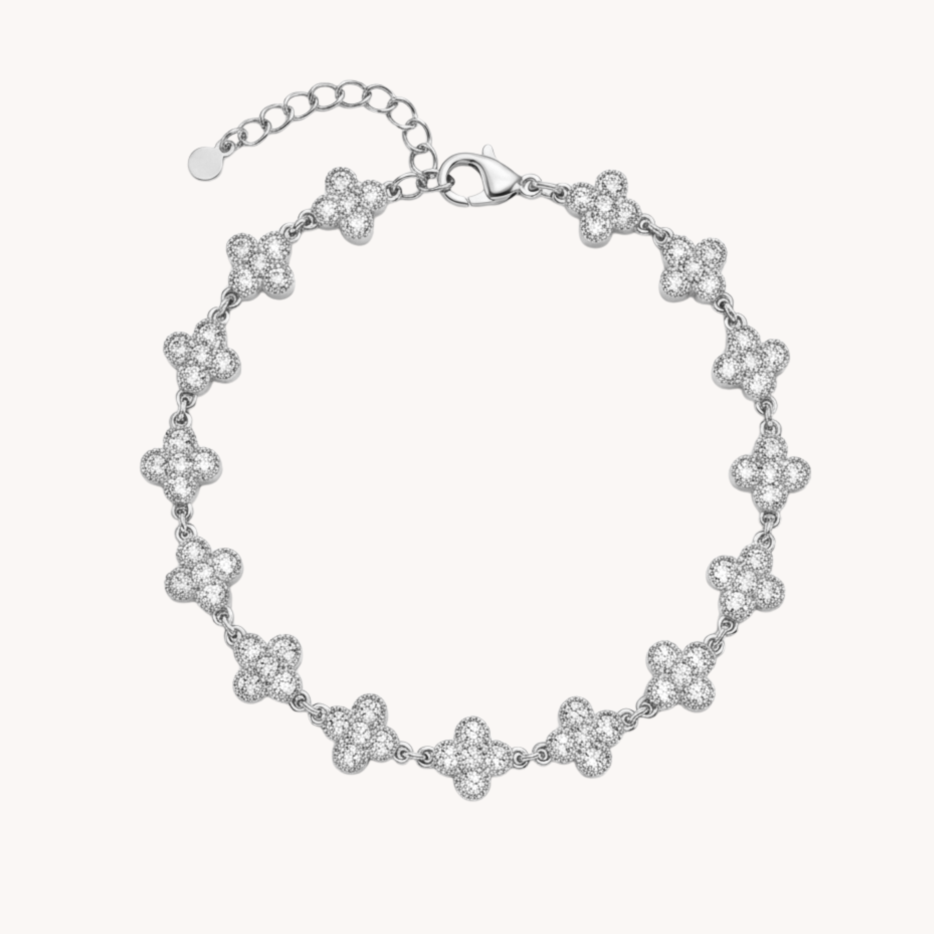Bracciale Quadrifoglio Shine Clover VANDEM in acciaio oro, bracciale da donna a maglia snodata con quadrifogli tempestati di strass bianchi lucidi.