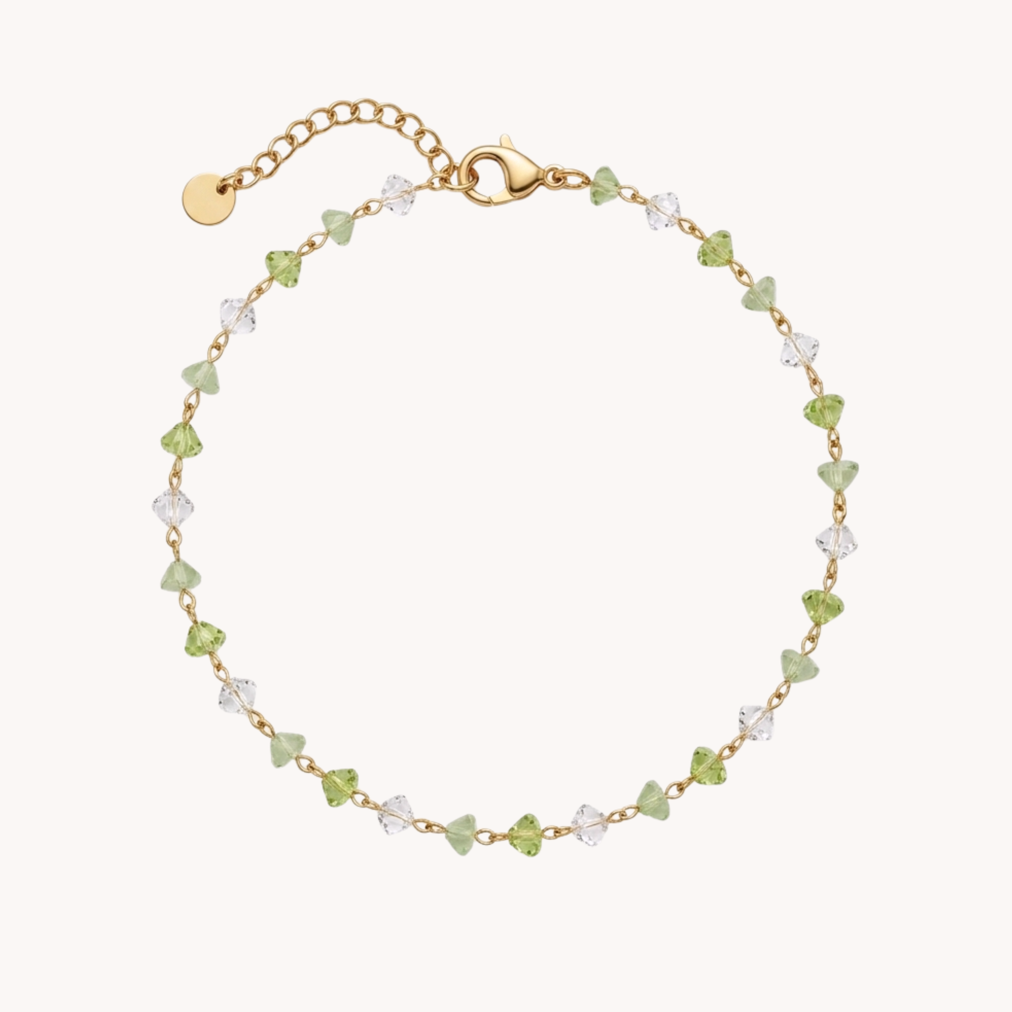 Cavigliera Perline Olive Glint VANDEM in acciaio oro, cavigliera da donna a filo singolo con cristalli romboidali verde oliva e bianchi lucidi