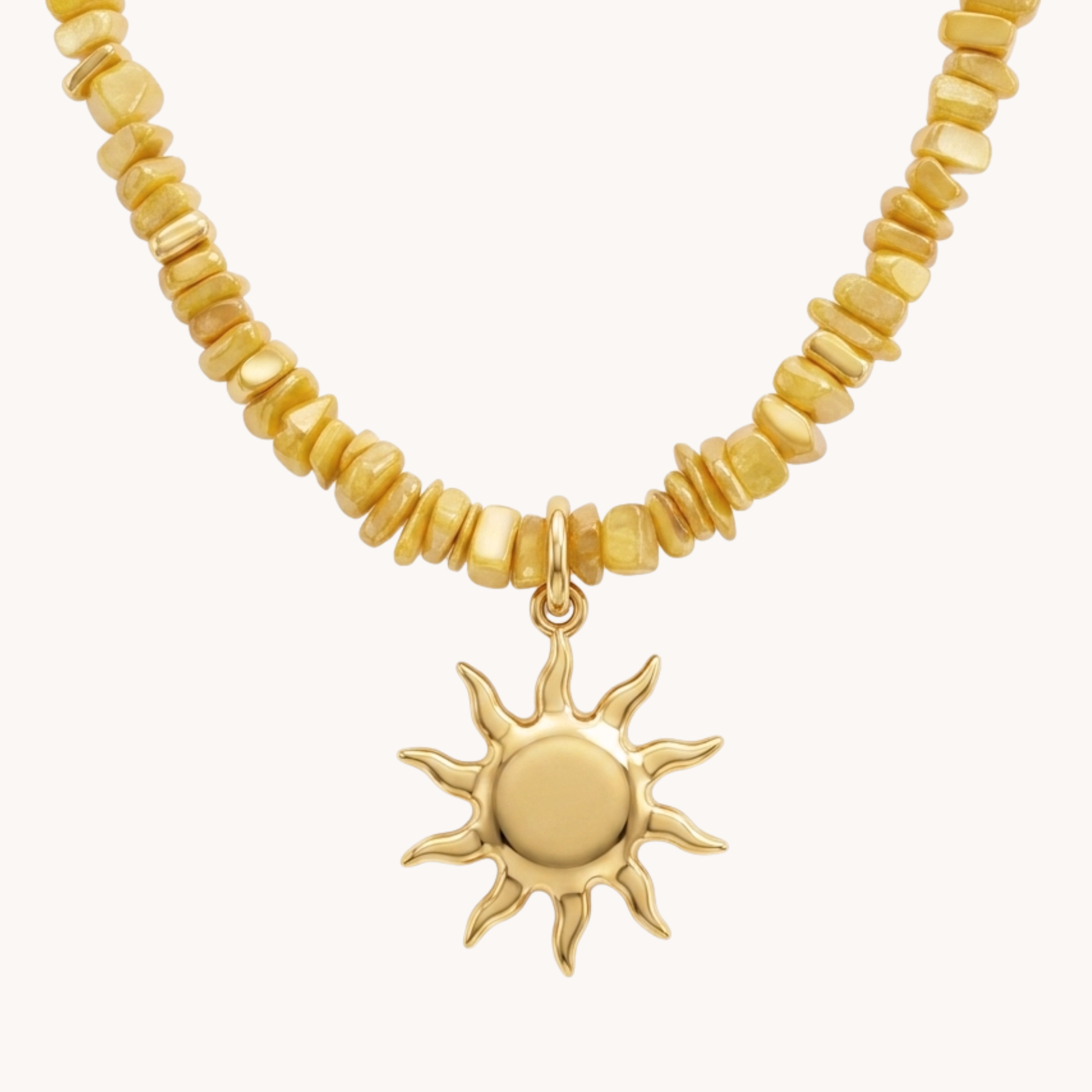 Girocollo Giallo Sole Amber Chip VANDEM in acciaio oro, collana da donna con scaglie di pietra gialla lucida e ciondolo a forma di sole a sbalzo
